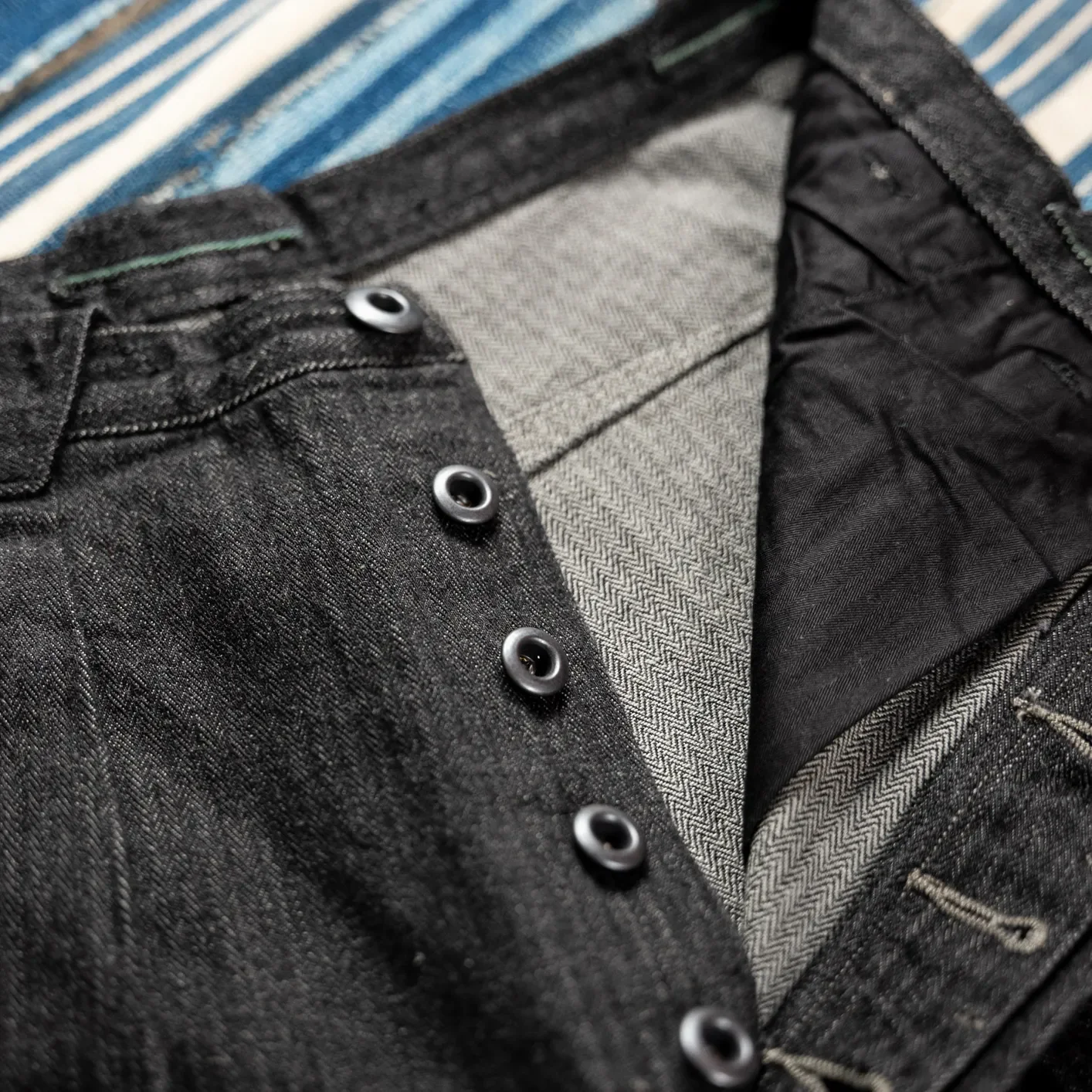MotivMfg Pleat Herringbone Denim Trousers - Black / Classic Straight - Image 4