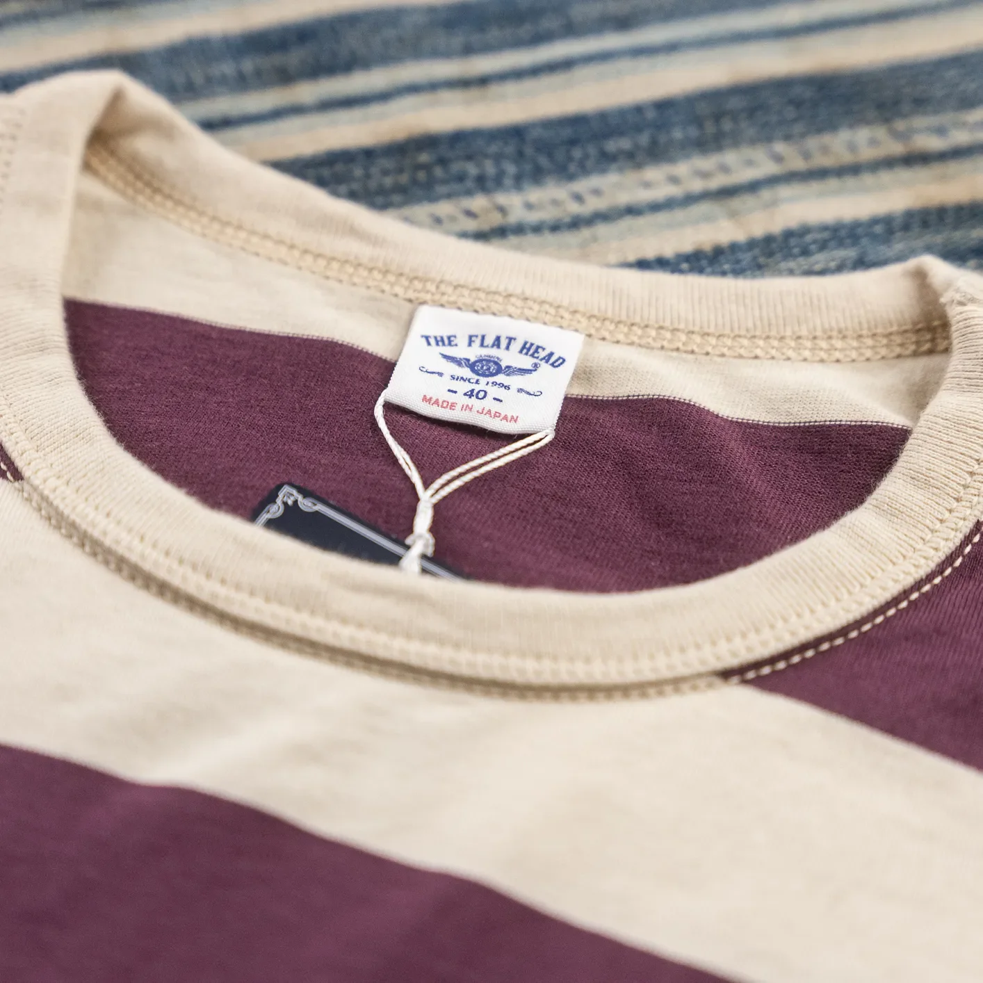 The Flat Head 9.5oz Border T-Shirt - Ivory / Purple - Image 2